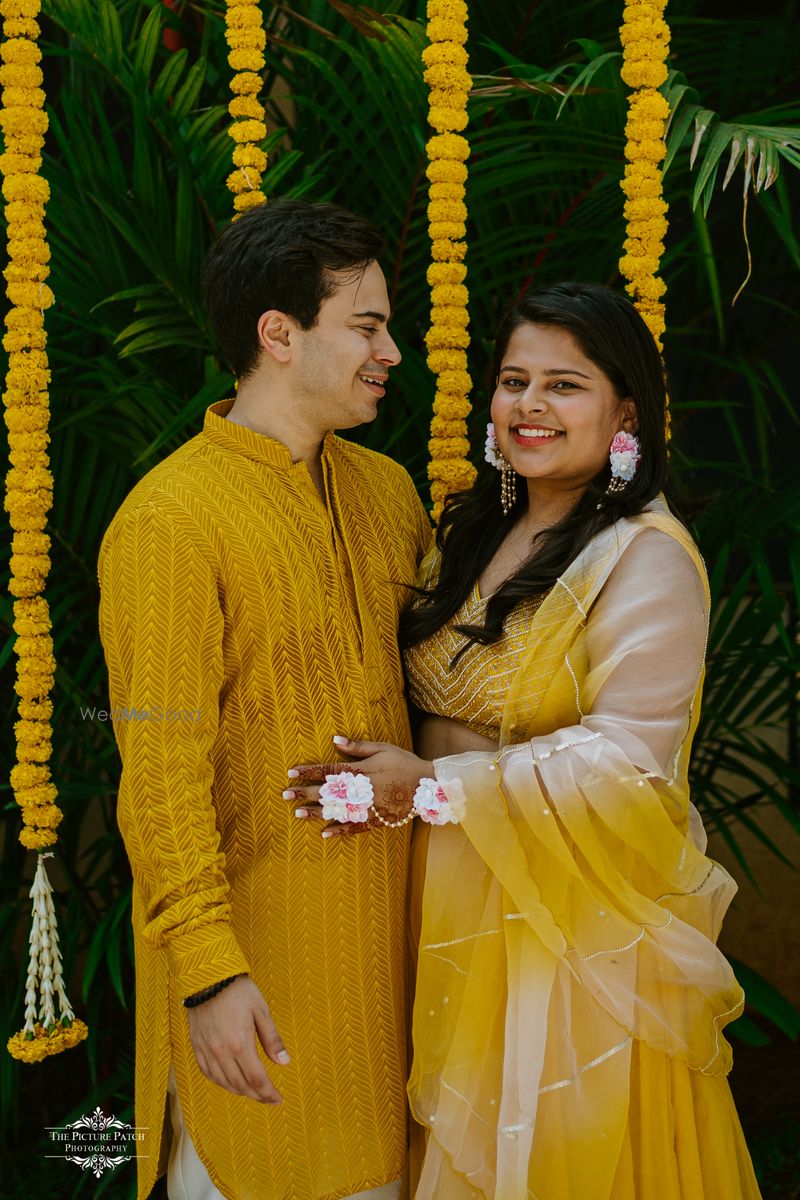 Photo Of Couple Wearing Matching Yellow Outfits On Haldi