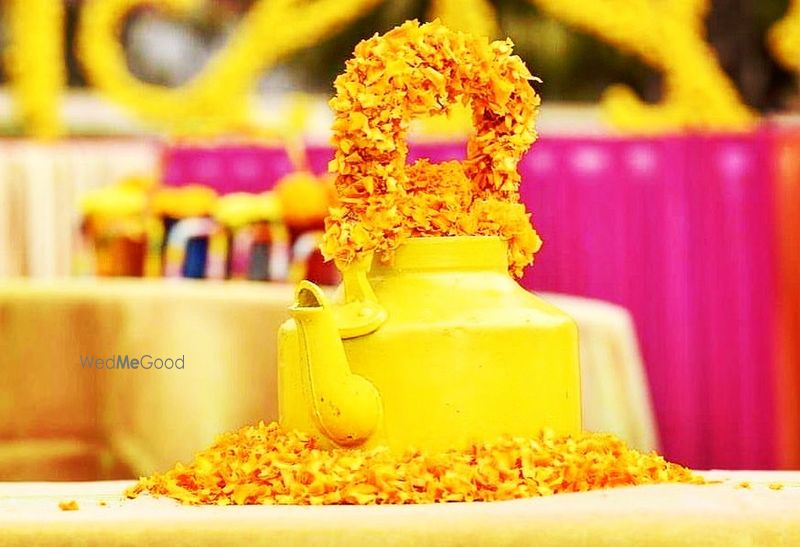 Photo of Floral tea kettle table centerpiece