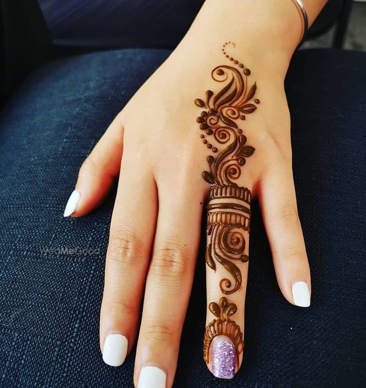 Share more than 84 simple mehndi design back finger latest - seven.edu.vn