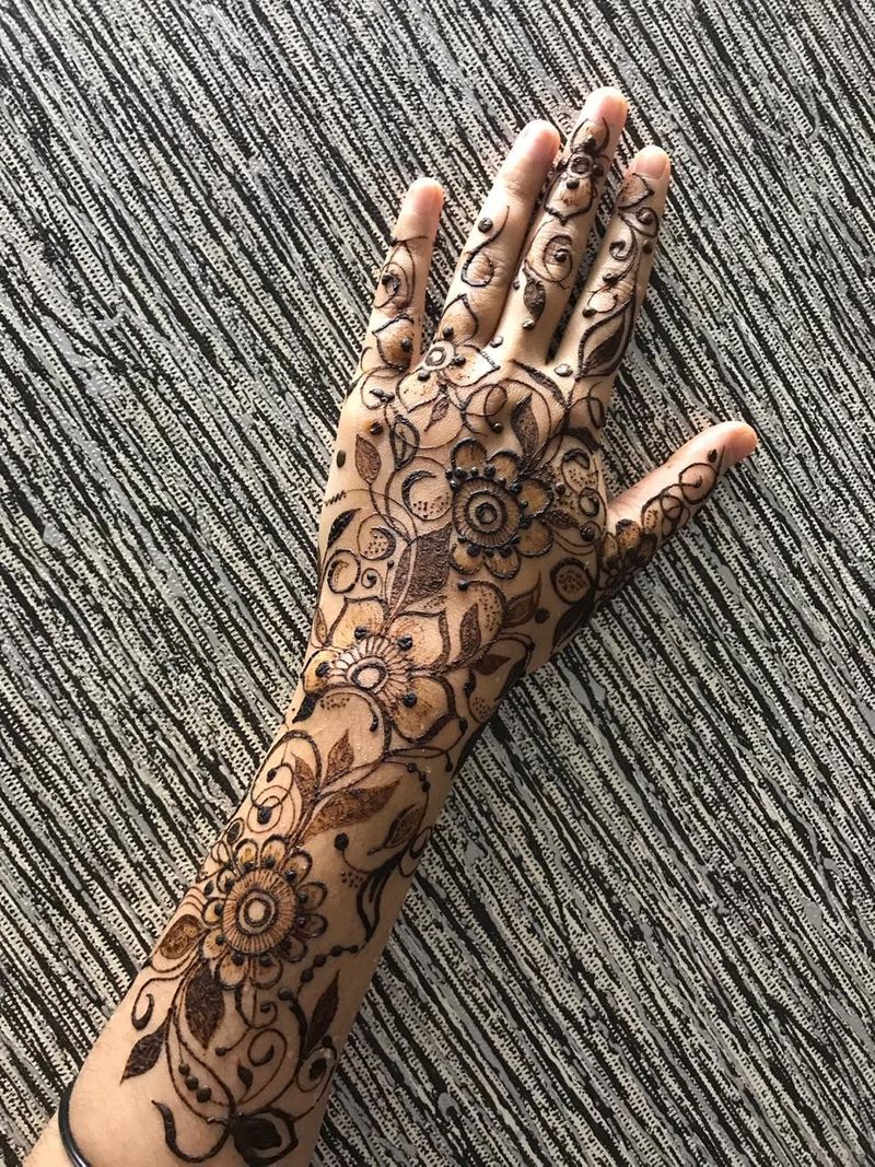 Photo of A unique arabic mehendi design with mandalas and flowers