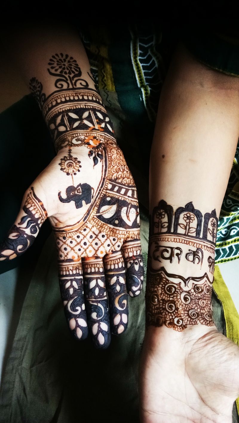 Traditional design with Elephant & Parrot .. @vibhagalamehendi_artist  Contact:- 9768155389 | Instagram