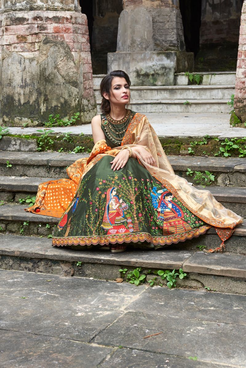 Photo of Mehendi coloured lehenga with madhubani motifs