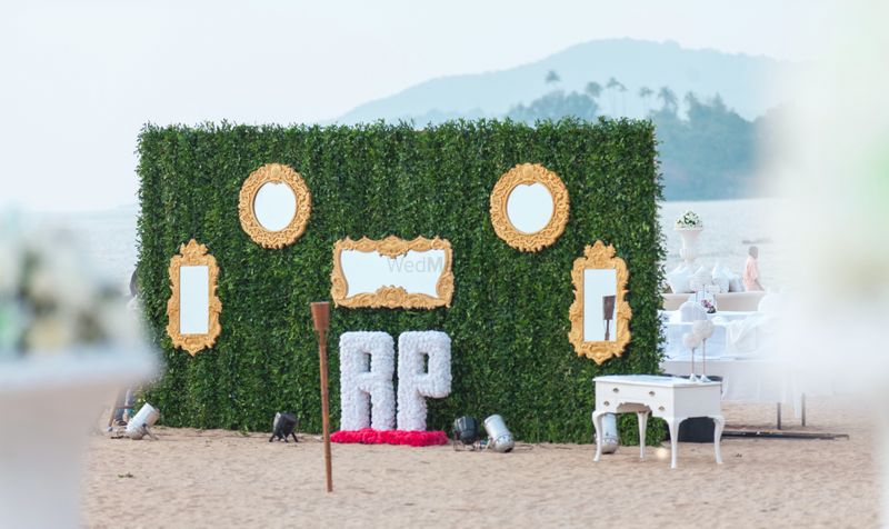 Photo Of Photo Booth Ideas With Green Grass Backdrop And Gold Enamelled Mirrors And Rp Initials