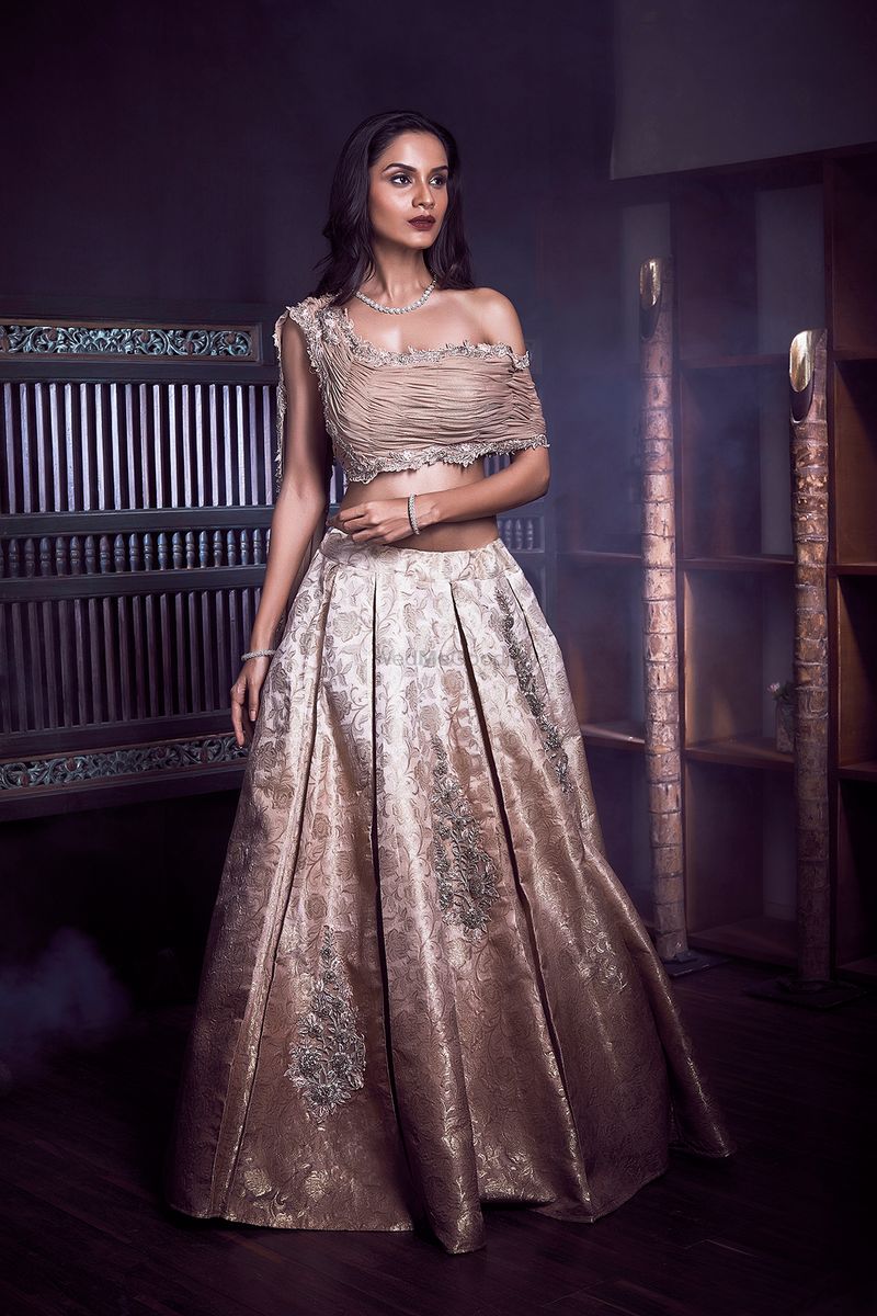Photo of Unique brocade lehenga with off shoulder blouse for sangeet