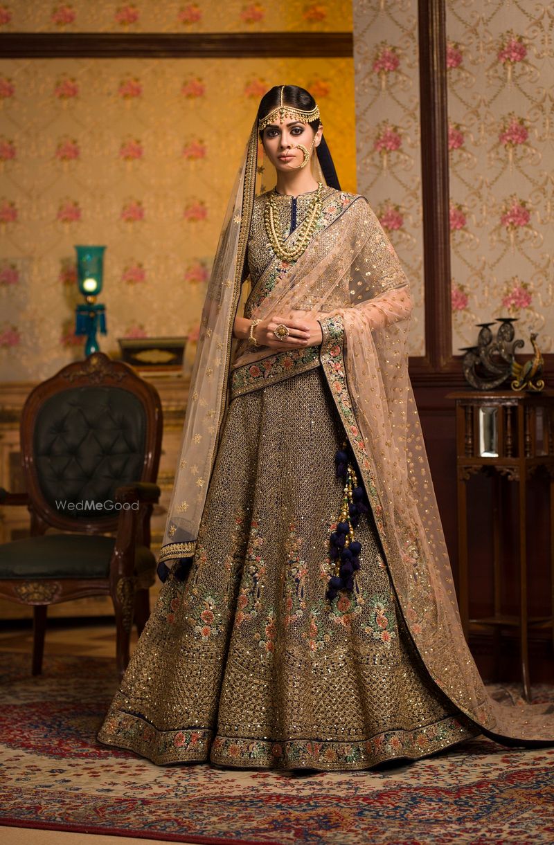 Photo of Beautiful peach and blue bridal lehnga