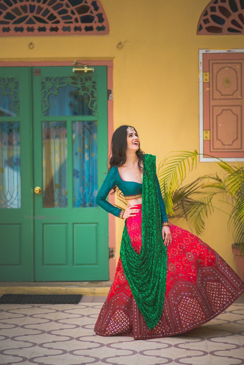 red and green bridal lehenga