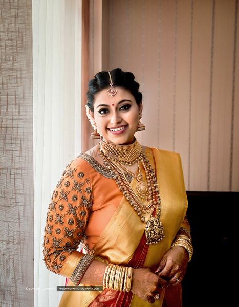 Photo of A south indian bride in a kanjeevaram and gold jewelry!
