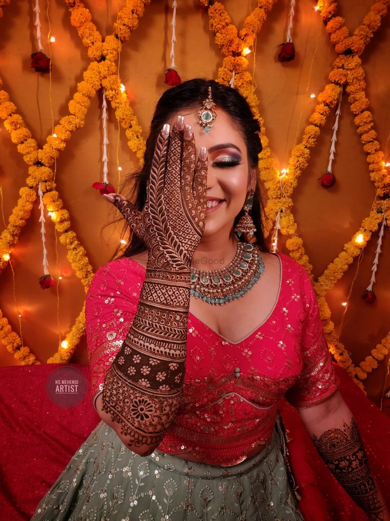 Captivating Nepali Bride with Mehendi-covered Hand and a Serious Gaze -  Photos Nepal