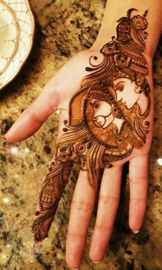 Beautiful henna design with elephant motifs, bride groom portraits, floral  motifs simply caught our eye.💚💚 Mehendi Artist: @pinalm... | Instagram