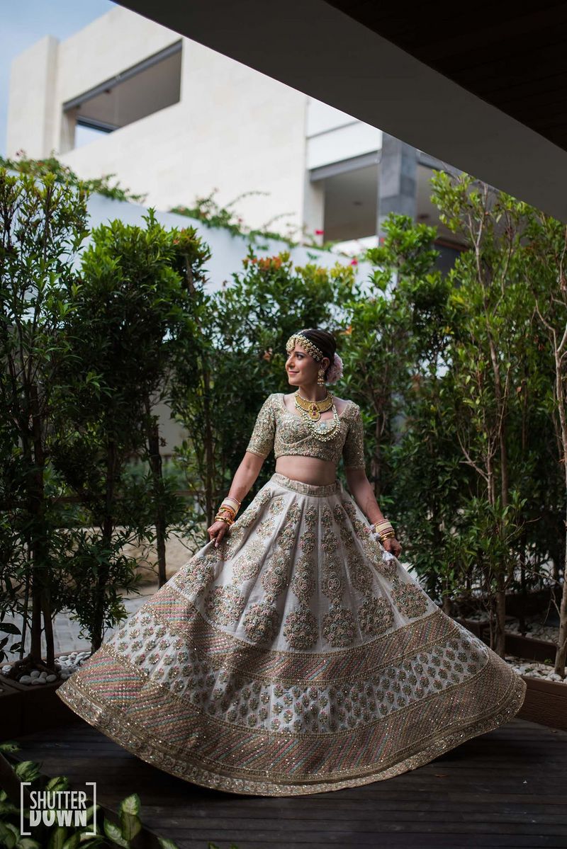 This Bride Wore A Unique Floral White Lehenga From Sabyasachi Mukherjee's  Collection For Her D-Day