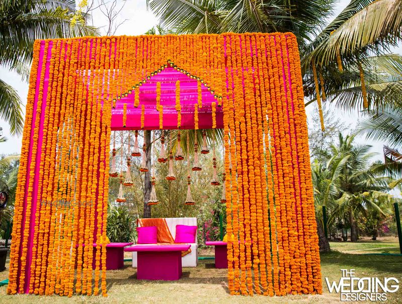 Photo of orange genda flower decor