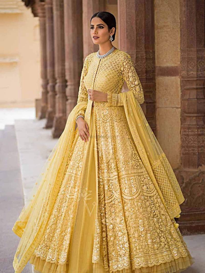 Yellow indo-western net dress by Vasansi