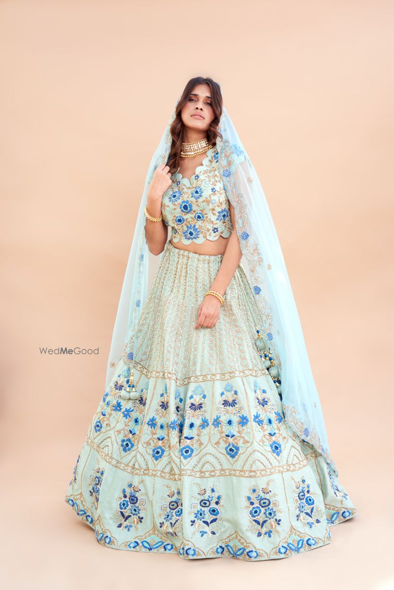 Aqua blue scalloped lehenga set by AYRA