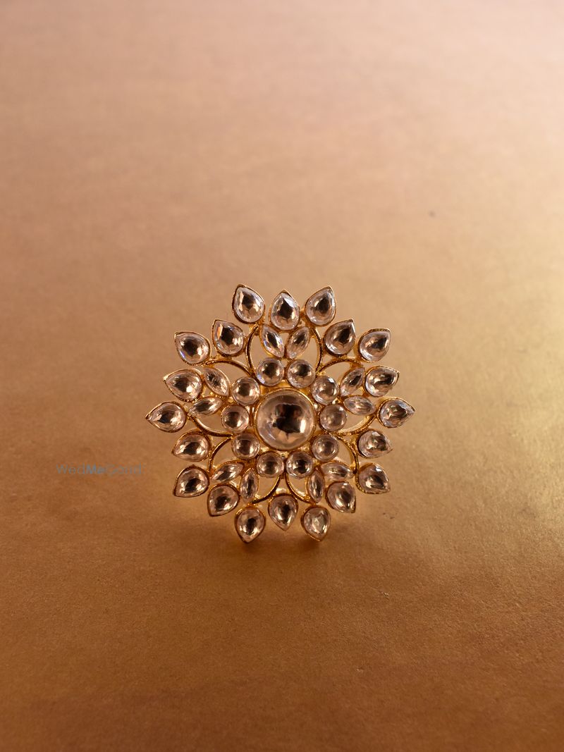 Golden ring in floral pattern by Our Purple Studio