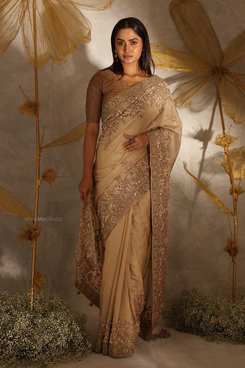 Mint gold tissue draped sari and blouse