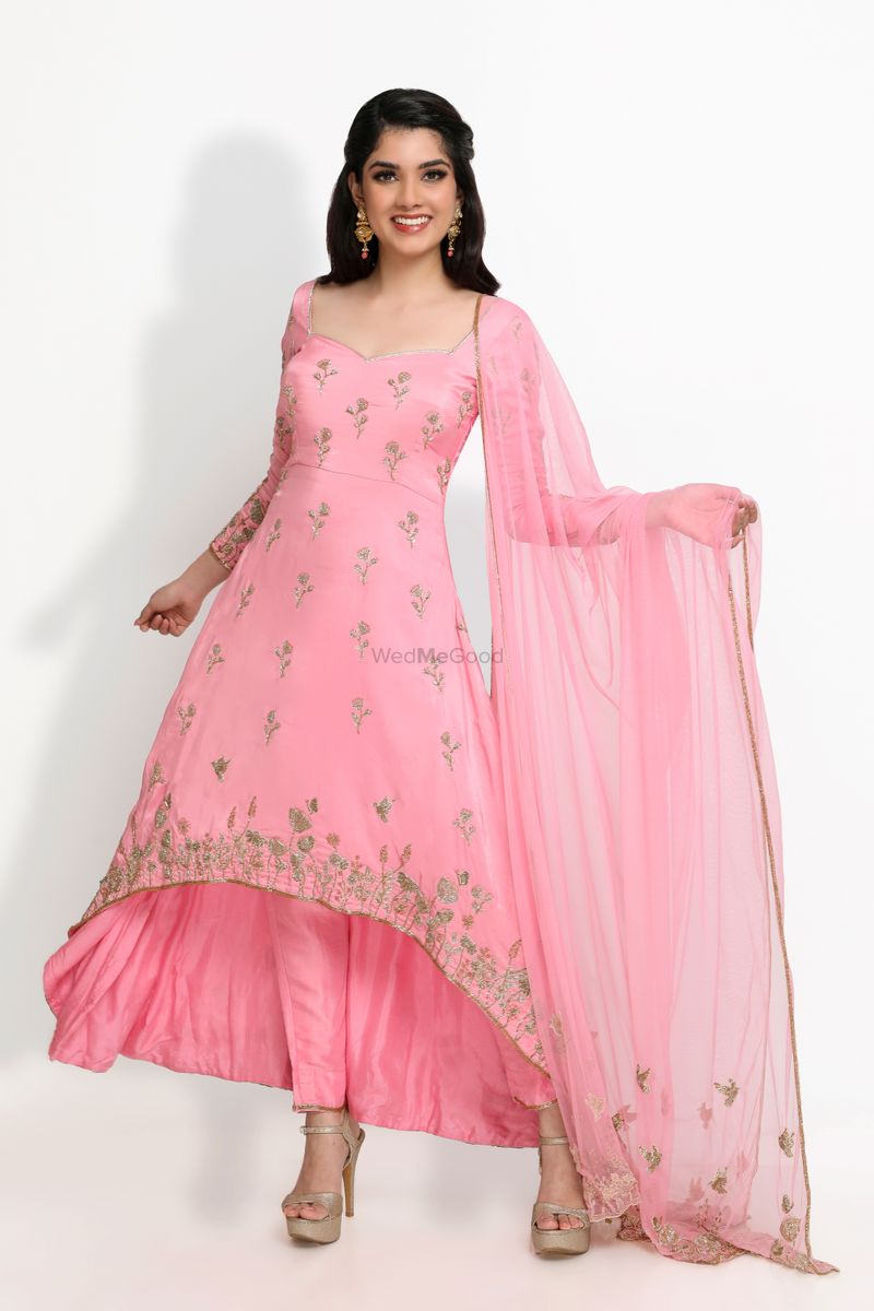 It is embroidered and brought to life with embellishments of zardozi ...